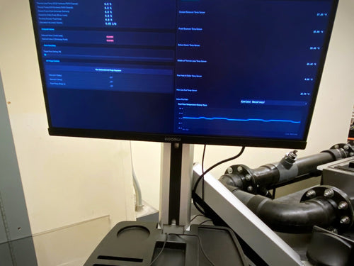 Aquafab Control software on a lab workstation beside a flow chamber